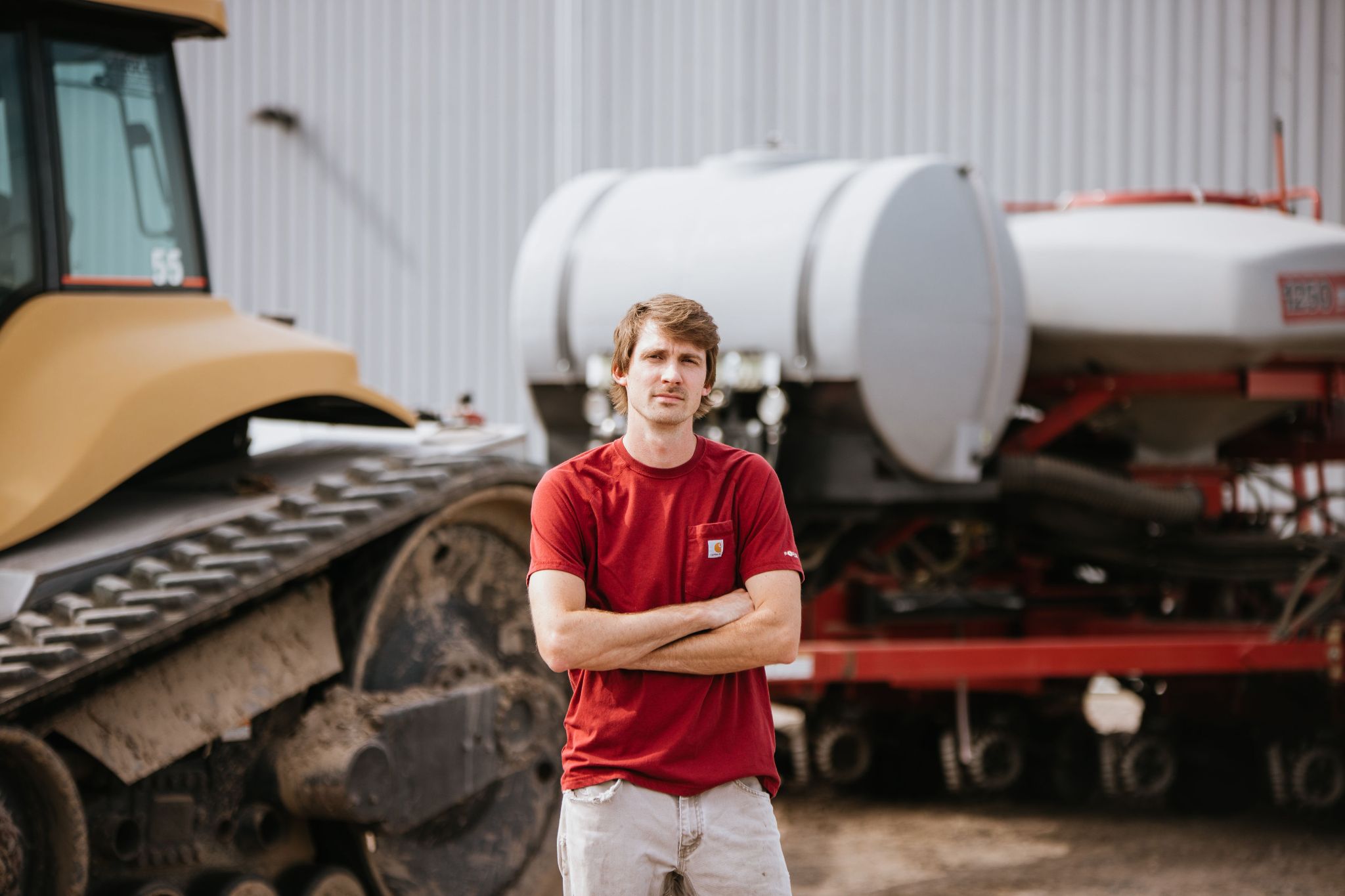 Farmer in front of tractor